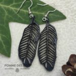 boucles d'oreilles plume d'oiseau cuir noir