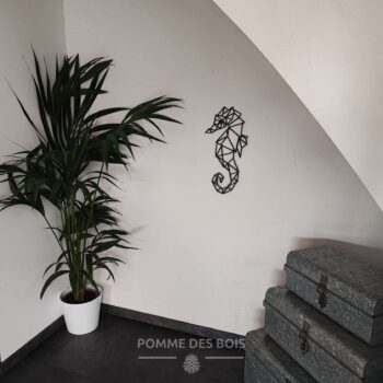 Un hippocampe de profil en origami.