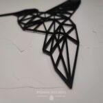 Un colibri de profil en origami.