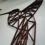 Un colibri de profil en origami.