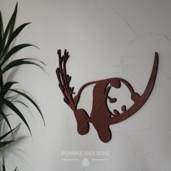 Un panda sur une branche.